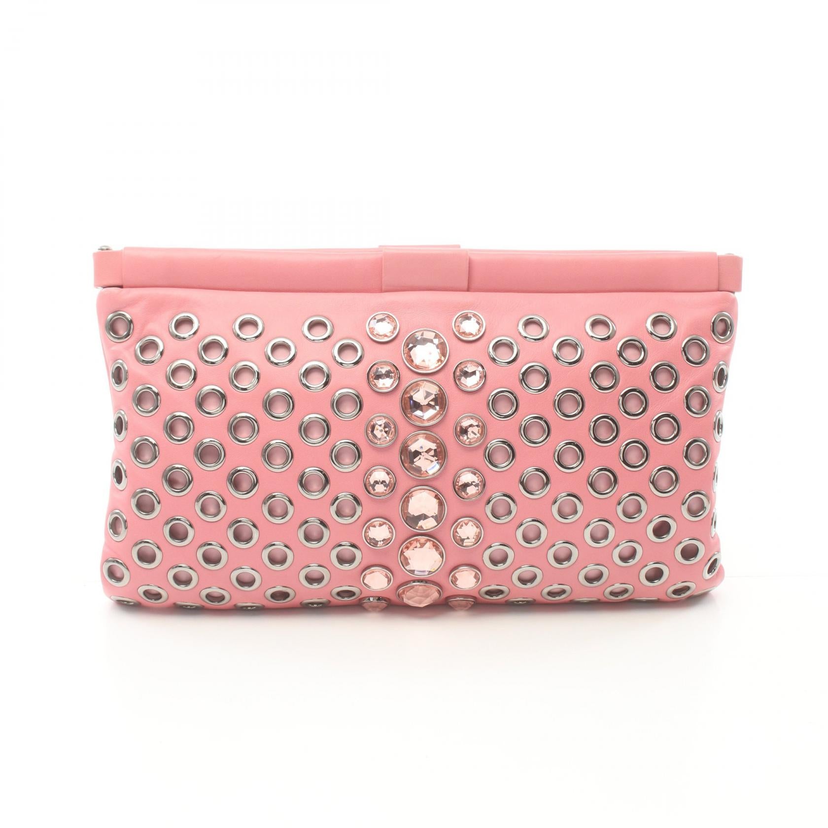 Miu Miu Leather Eyelets Clutch Leather Clutch Bag in Very Good Condition