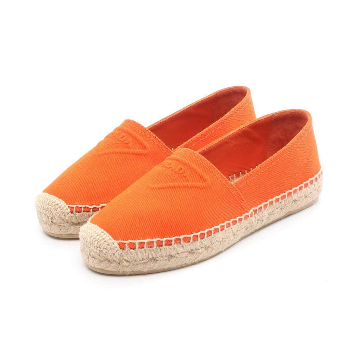 Prada Embossed Logo Canvas Slip On Shoes