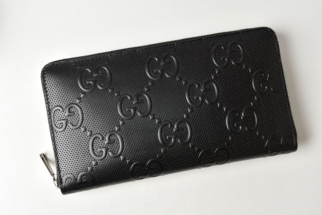 Gucci Leather Zip-Around Wallet GG Signature Embossed in Pristine Condition