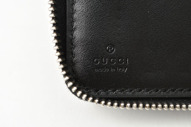 Gucci Leather Zip-Around Wallet GG Signature Embossed in Pristine Condition