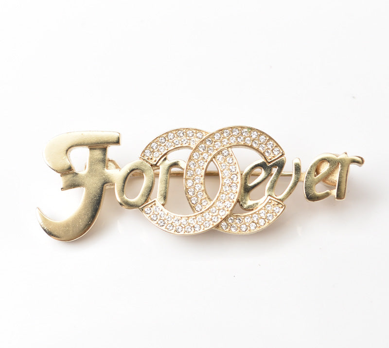 Chanel Brooch with Rhinestones and Coco Mark, Gold in Great Condition