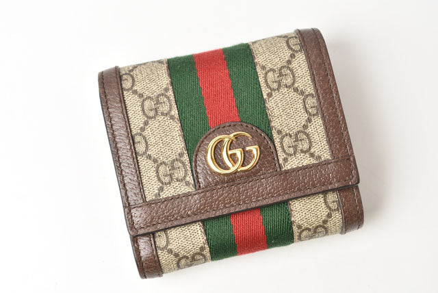 Gucci GG Supreme Leather Bifold Wallet in Pristine Condition