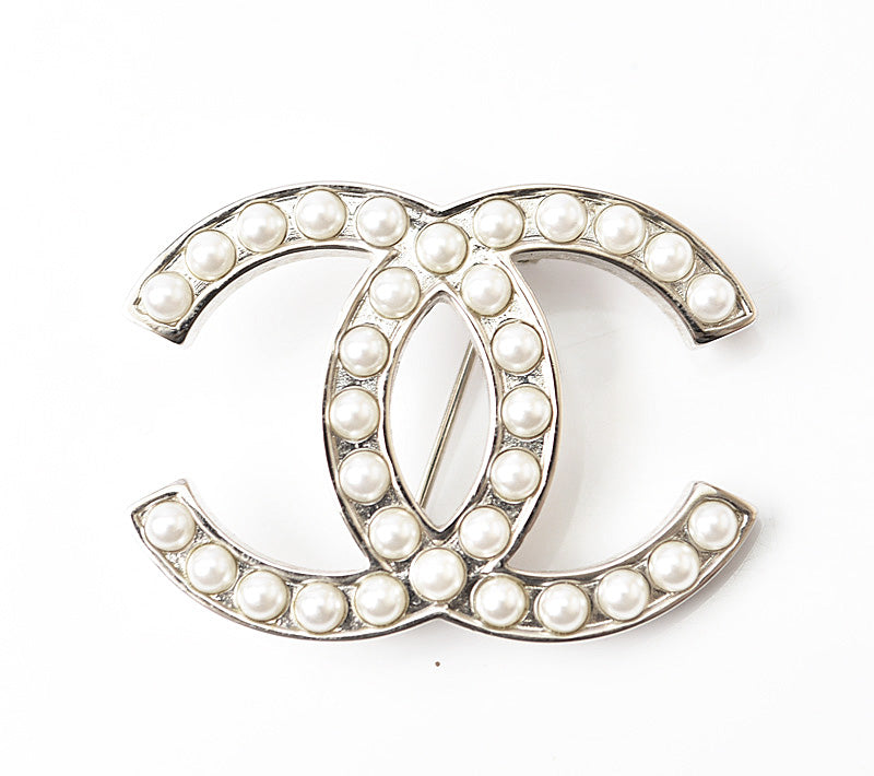 Chanel Brooch with Metal and Faux Pearl in Great Condition