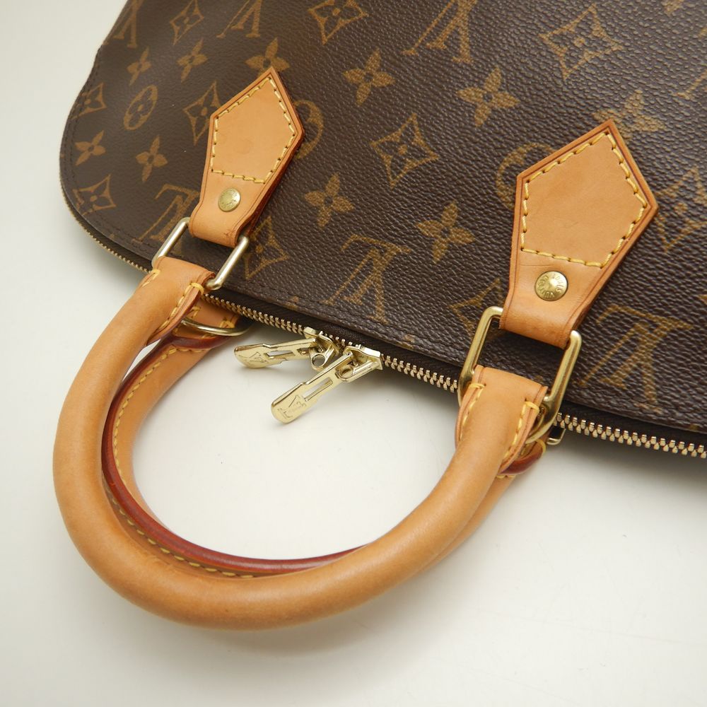 Louis Vuitton Monogram Alma Handbag M51130