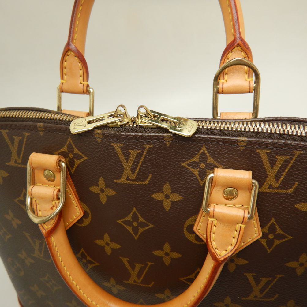 Louis Vuitton Monogram Alma Handbag M51130