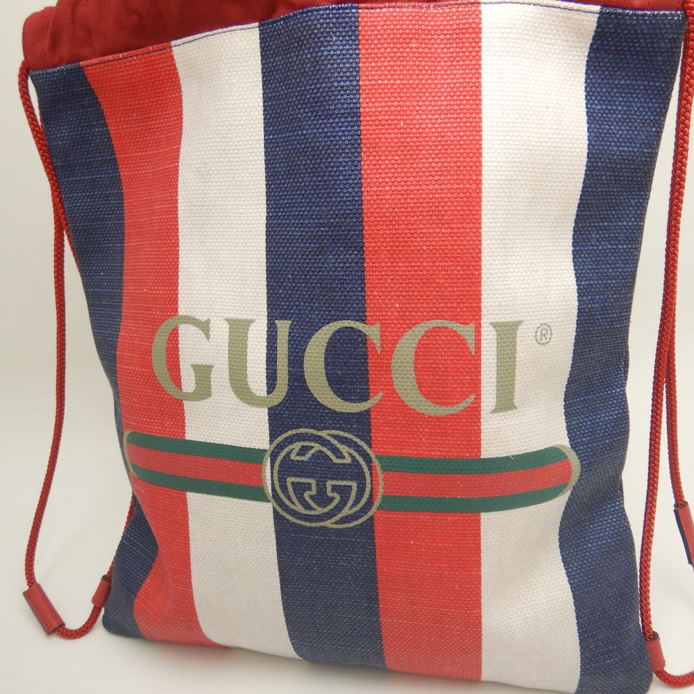 Gucci Canvas Leather Drawstring Backpack