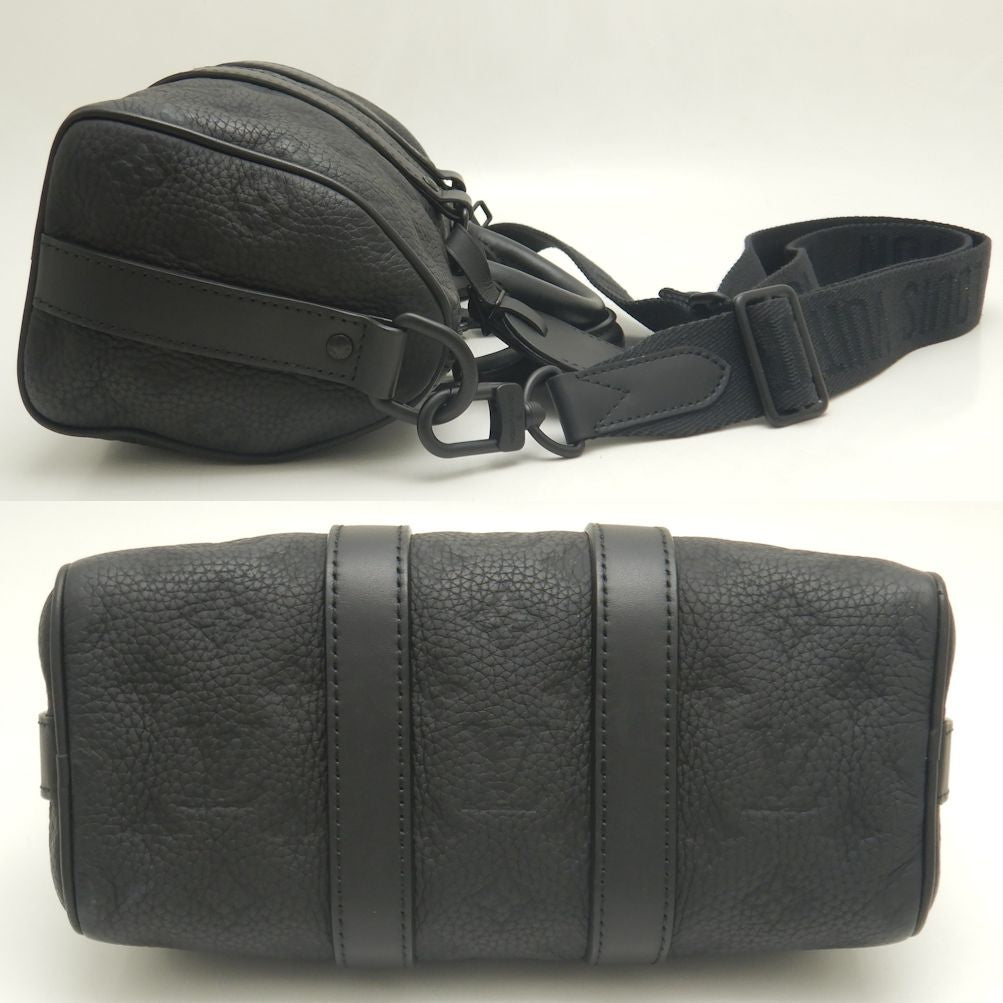 Louis Vuitton Leather Keepall Bandouliere 25 Handbag