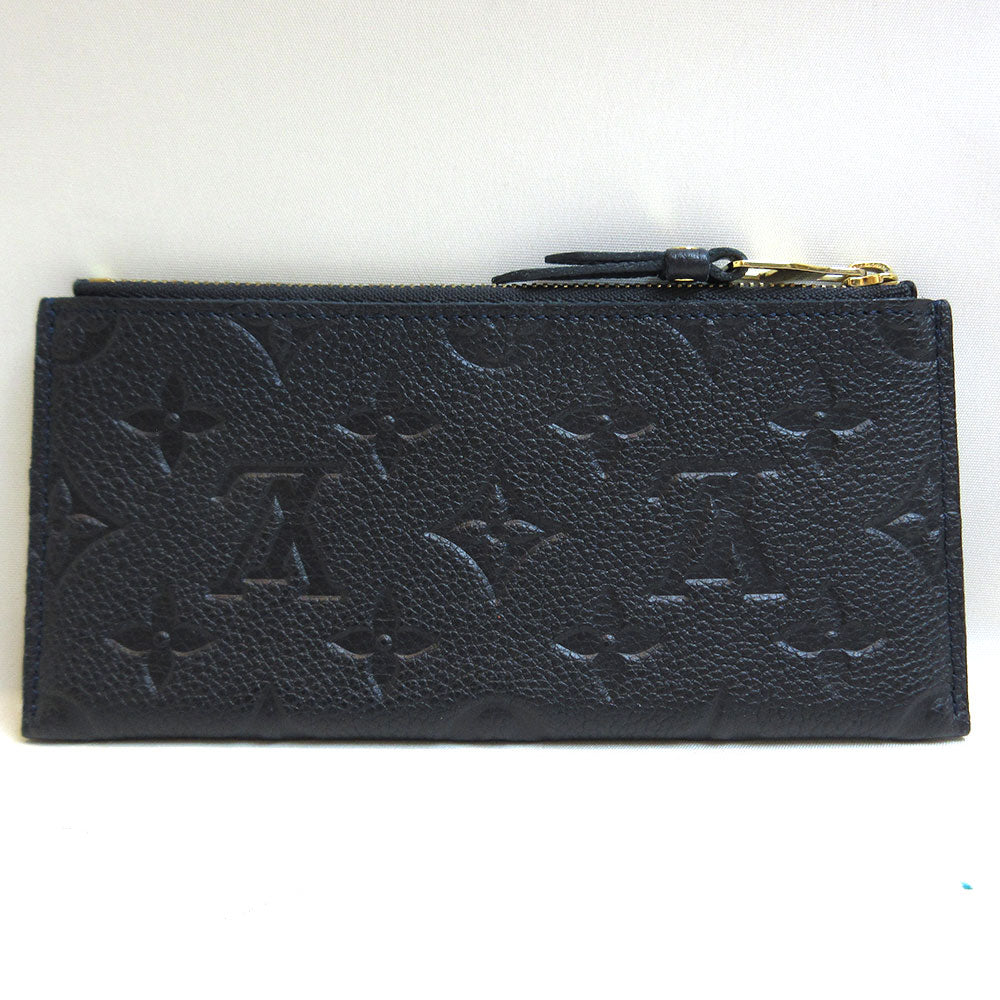 Louis Vuitton Monogram Empreinte Mini Pouch Coin Case in Very Good Condition