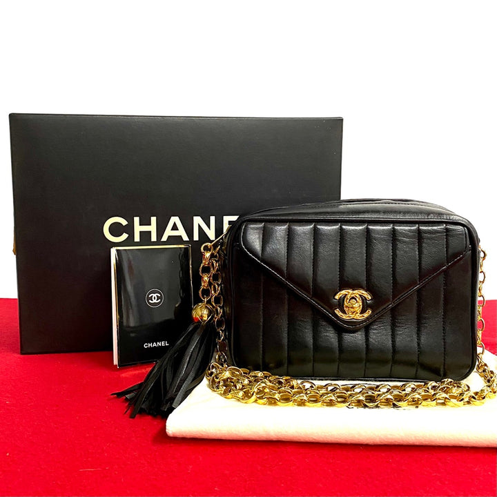 Chanel CC Vertical Quilted Flap Camera Bag  Leather Crossbody Bag in Very Good Condition