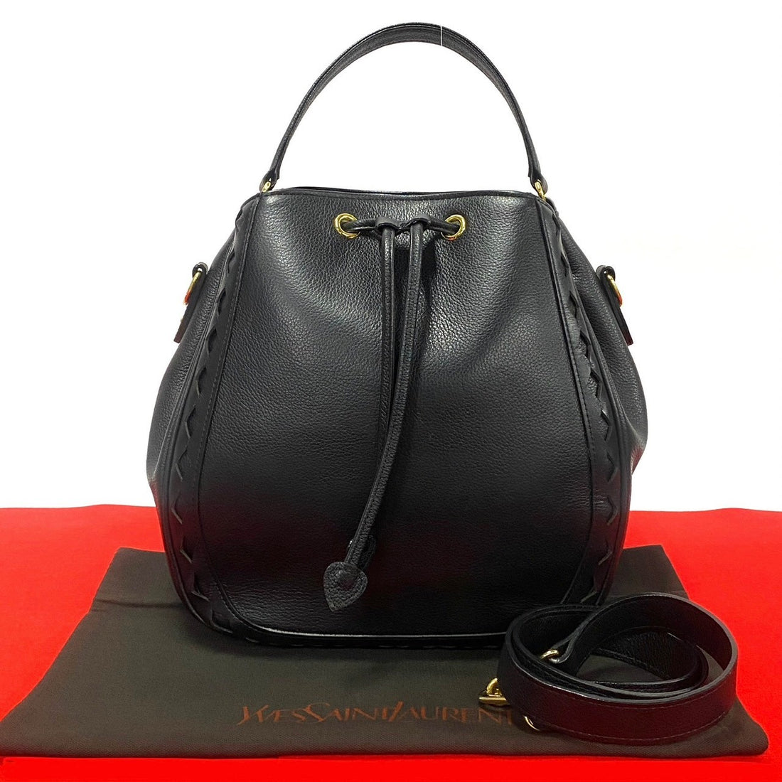 Yves Saint Laurent Diamond Cut Drawstring Bag Leather Crossbody Bag