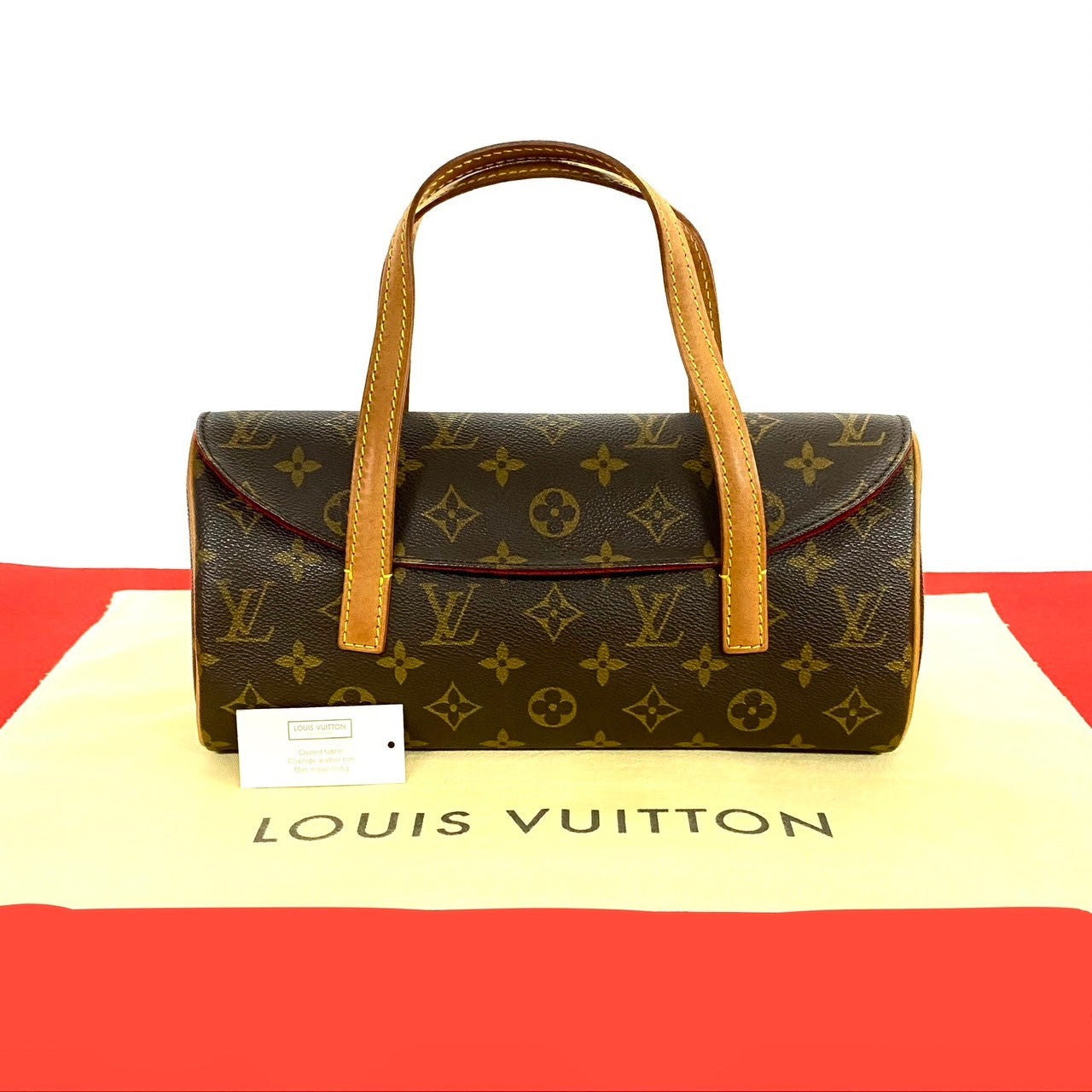 Louis Vuitton Sonatine Leather Handbag Brown