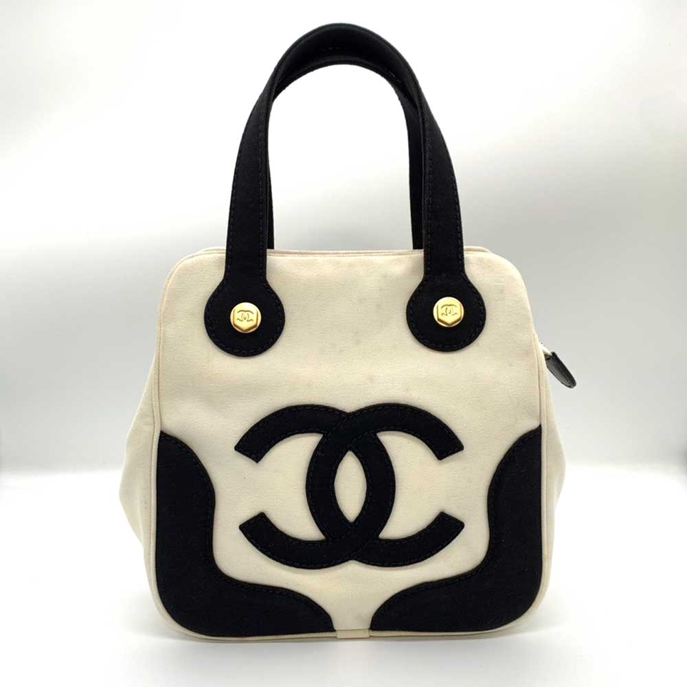 Chanel Canvas Marshmallow Handbag Ivory Black in Very Good Condition