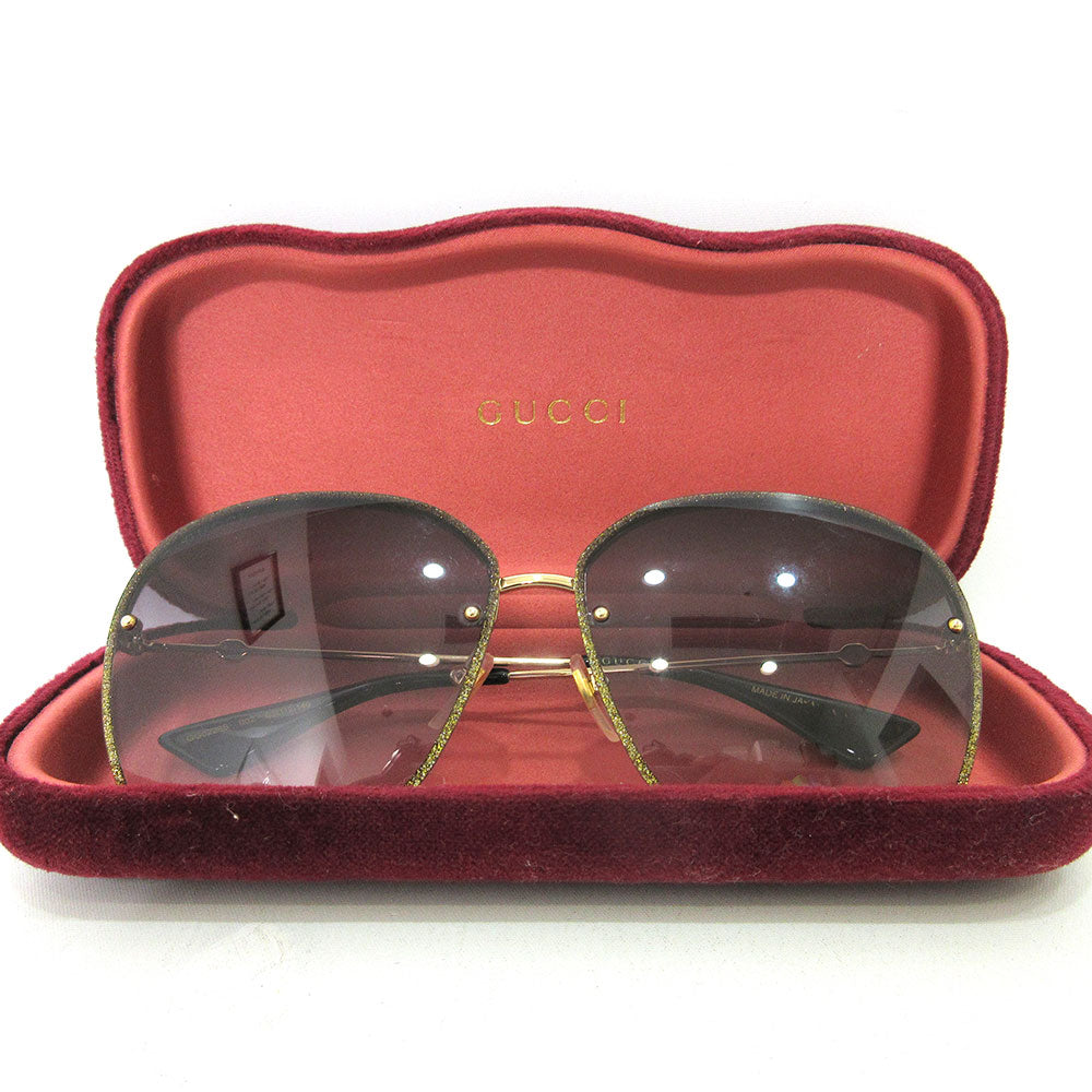 Gucci Metal Sunglasses GG0228S in Very Good Condition