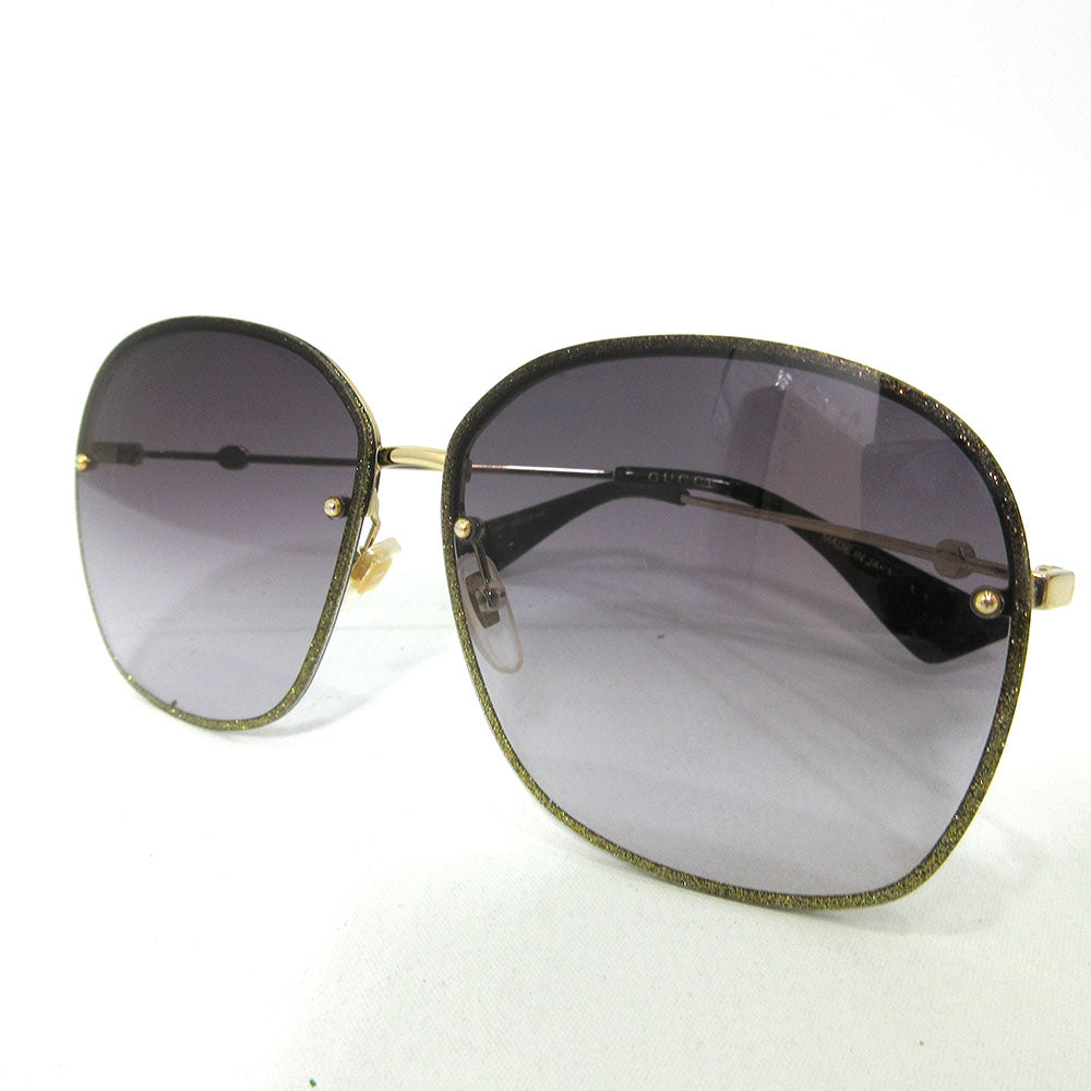 Gucci Metal Sunglasses GG0228S in Very Good Condition