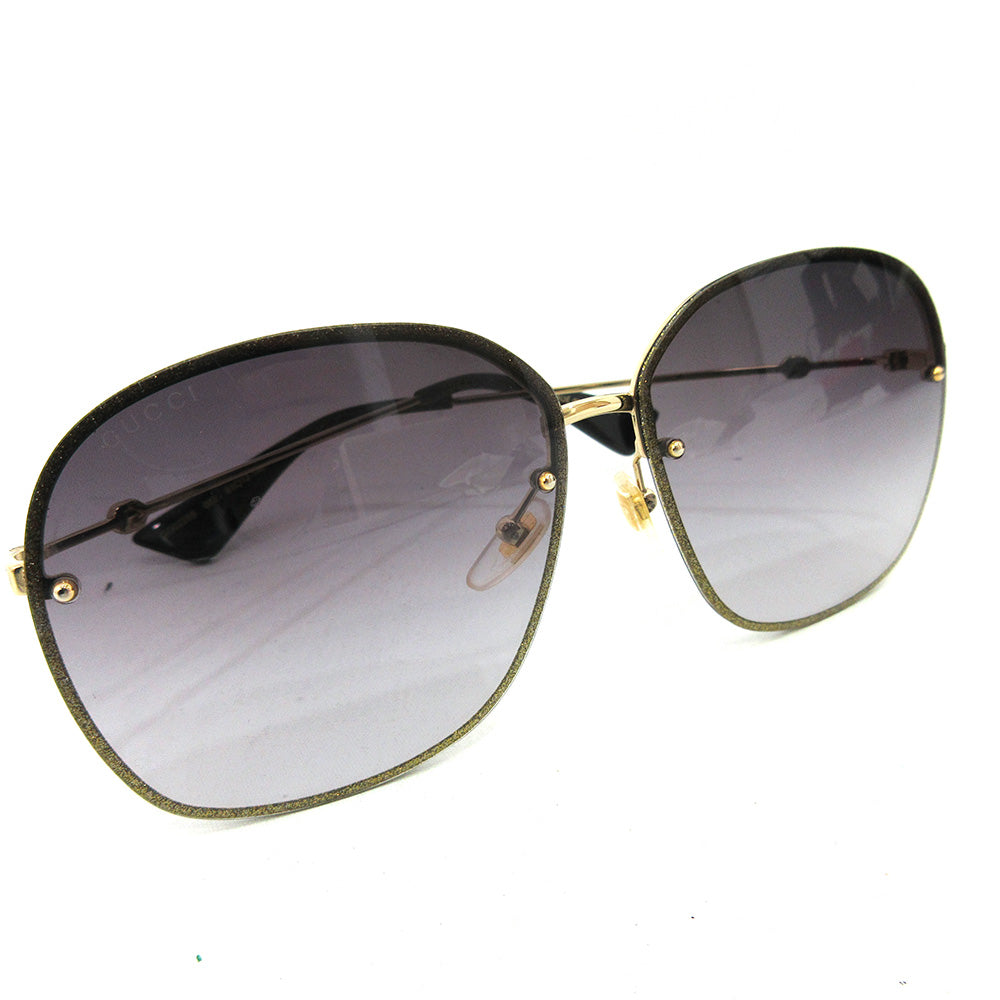 Gucci Metal Sunglasses GG0228S in Very Good Condition