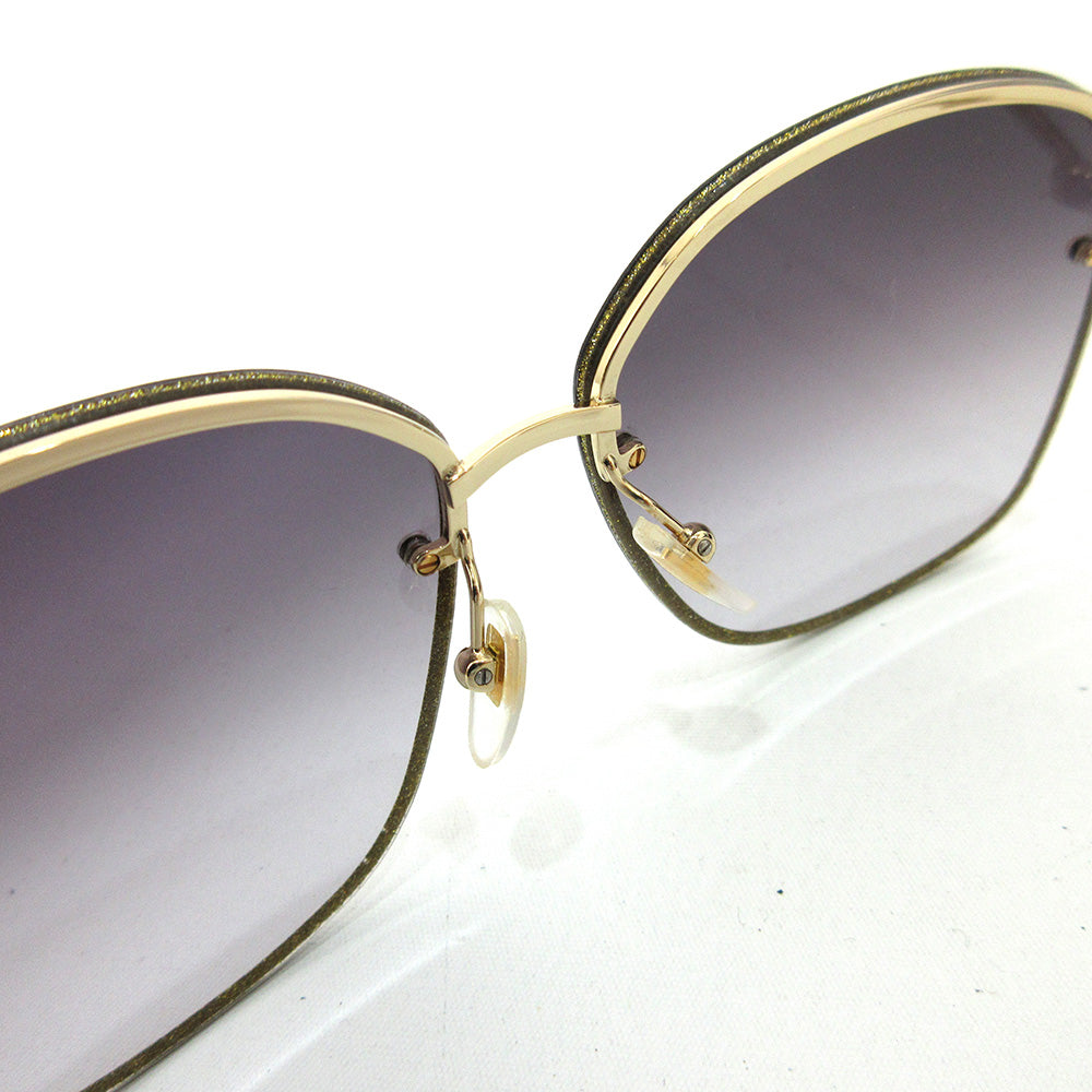 Gucci Metal Sunglasses GG0228S in Very Good Condition