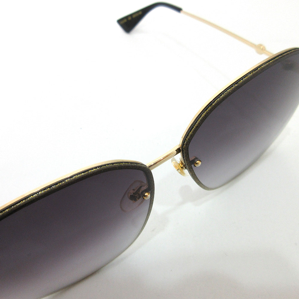 Gucci Metal Sunglasses GG0228S in Very Good Condition