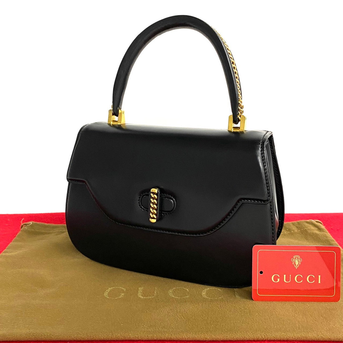 Gucci Leather Turnlock Top Handle Bag  Leather Handbag in Very Good Condition