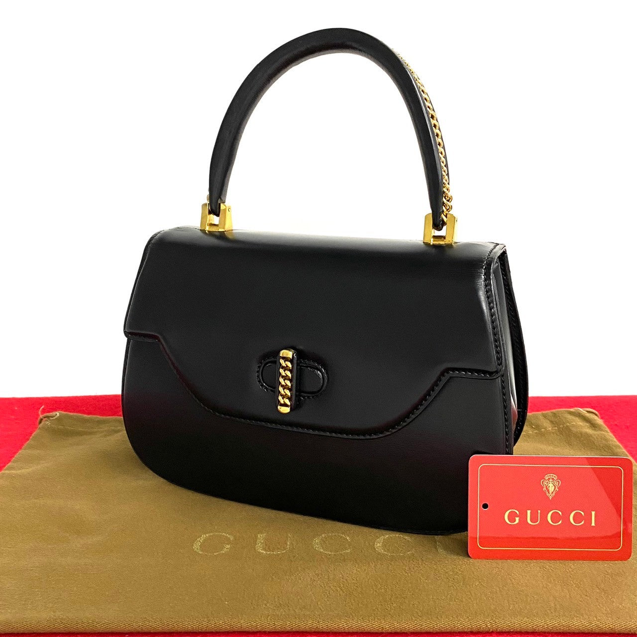 Gucci Leather Turnlock Top Handle Bag  Leather Handbag in Good condition