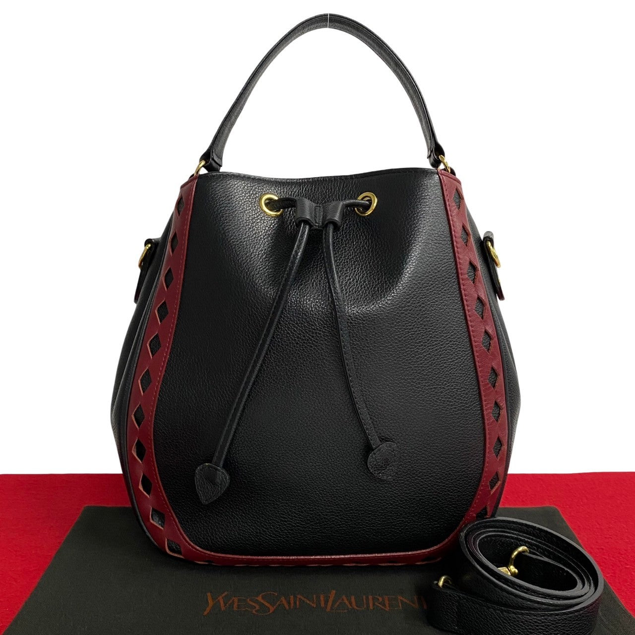 Yves Saint Laurent Diamond Cut Leather Drawstring Bag Leather Handbag in Excellent condition