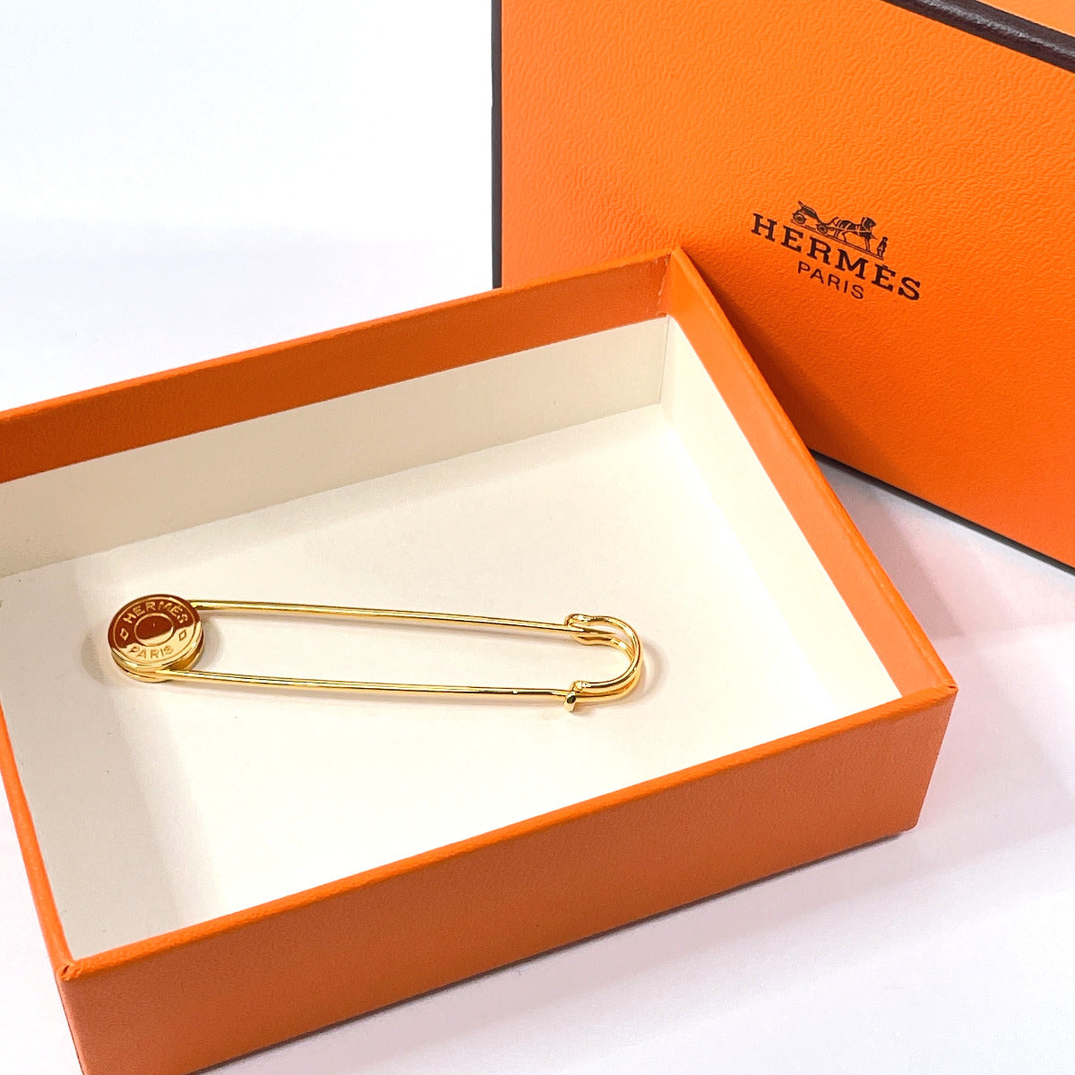 Hermes Metal Sellier Pin Brooch Gold