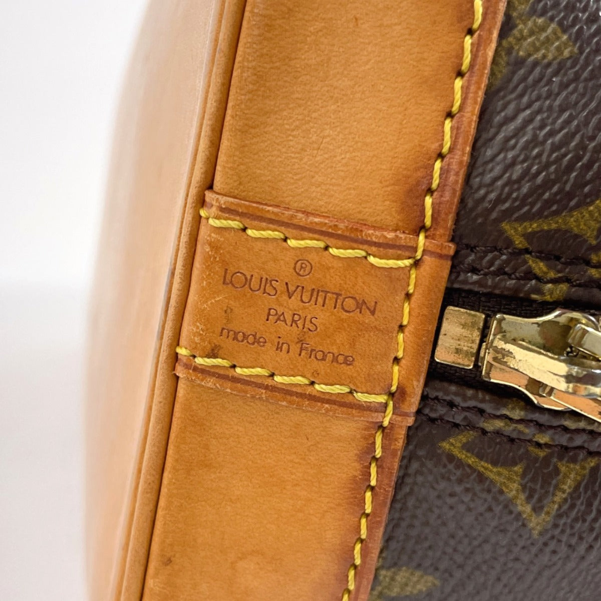 Louis Vuitton Alma Monogram Canvas Handbag