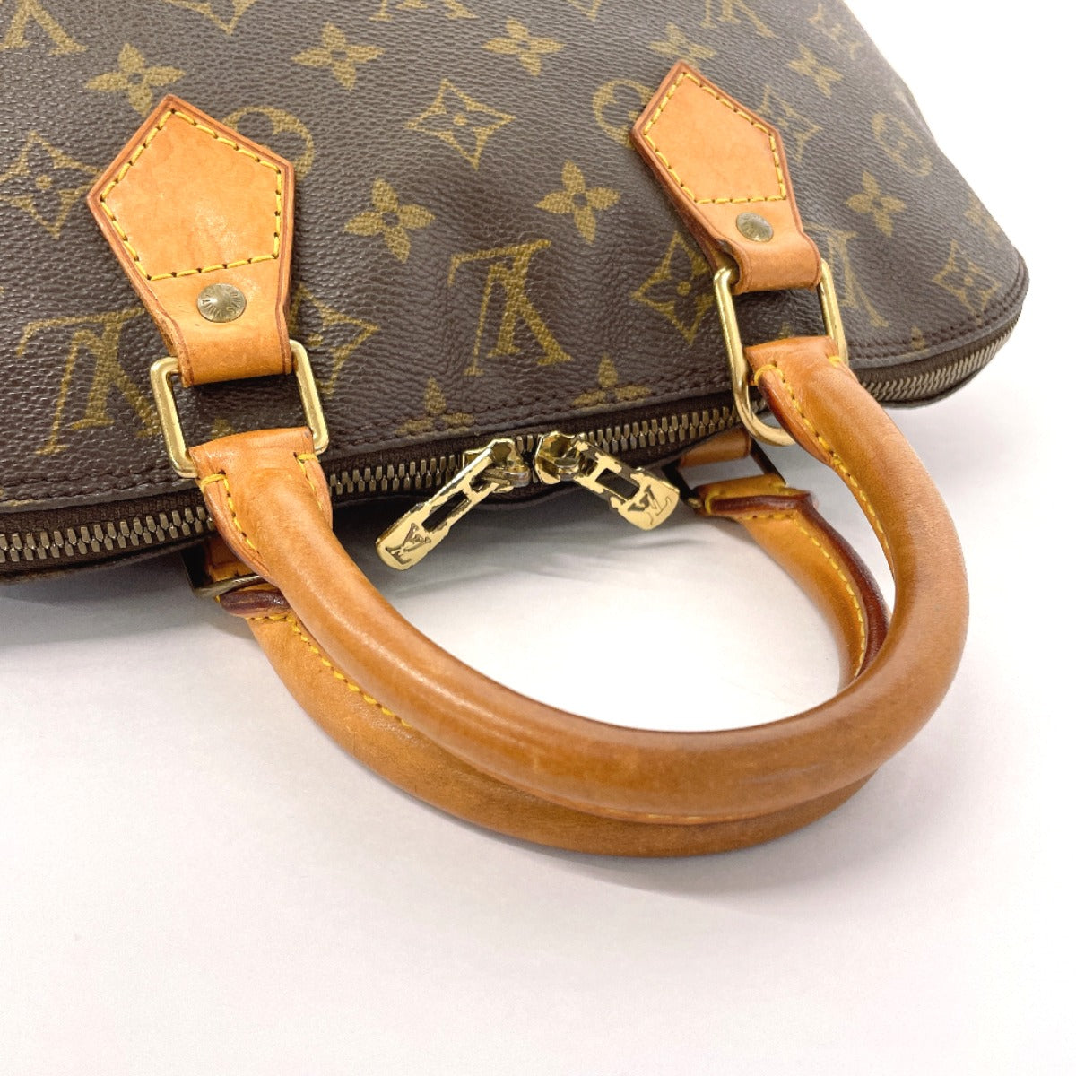 Louis Vuitton Alma Monogram Canvas Handbag