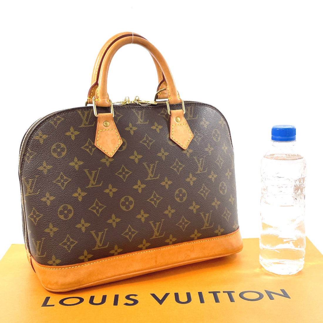 Louis Vuitton Alma Monogram Canvas Handbag