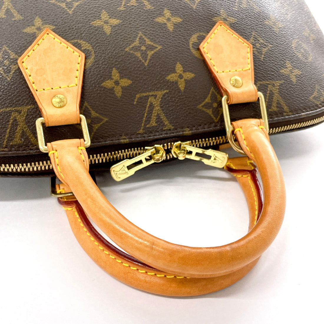 Louis Vuitton Alma Monogram Canvas Handbag