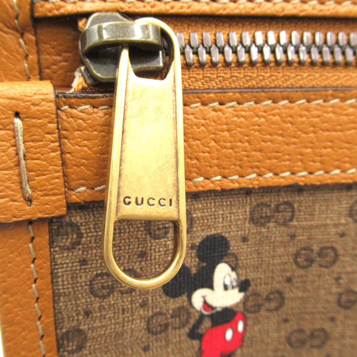 Gucci X Disney GG Supreme Clutch Bag 602552