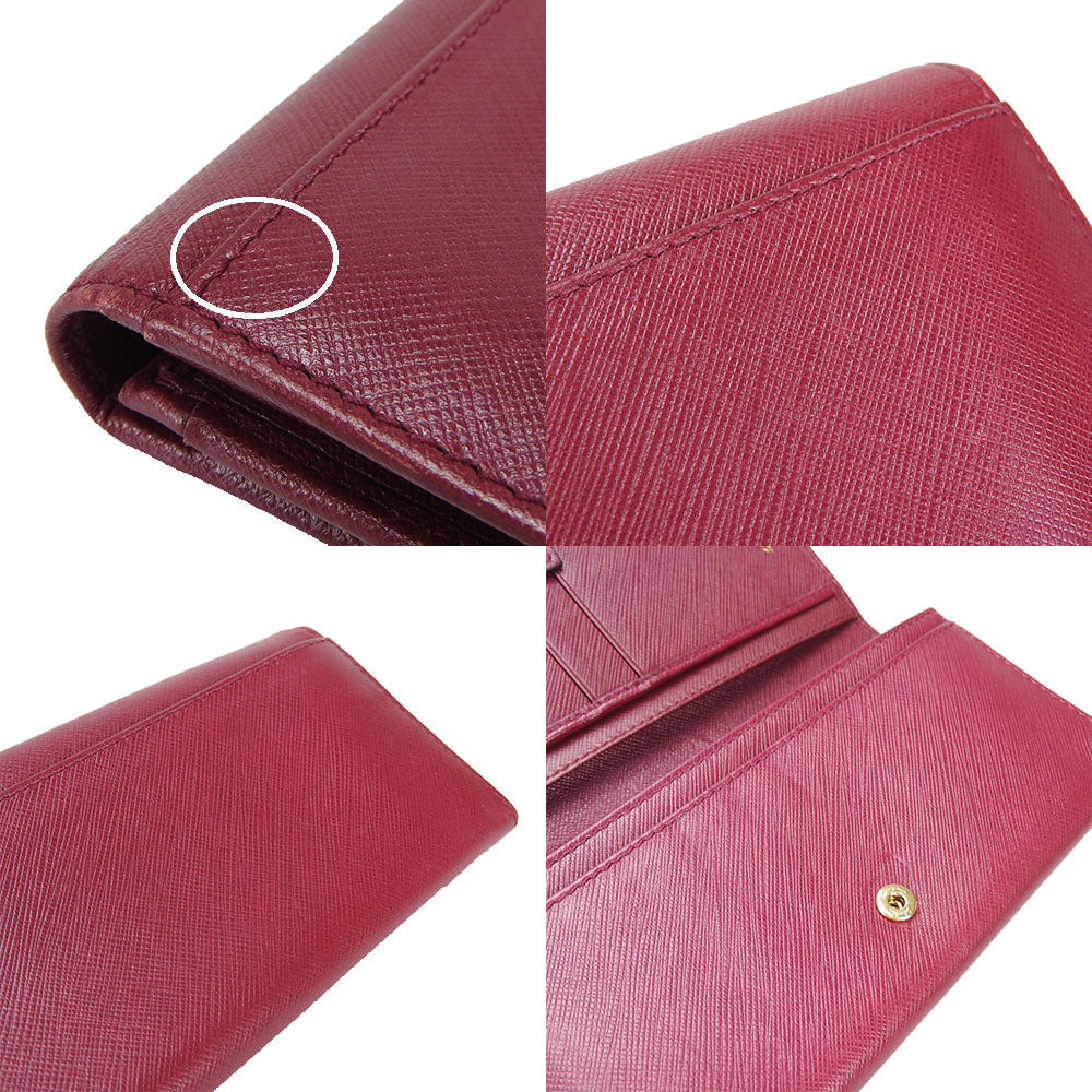 Salvatore Ferragamo Leather Bifold Wallet Purple