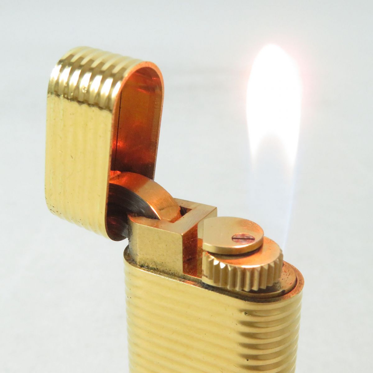 Cartier Gold Oval Roller Gaslighter