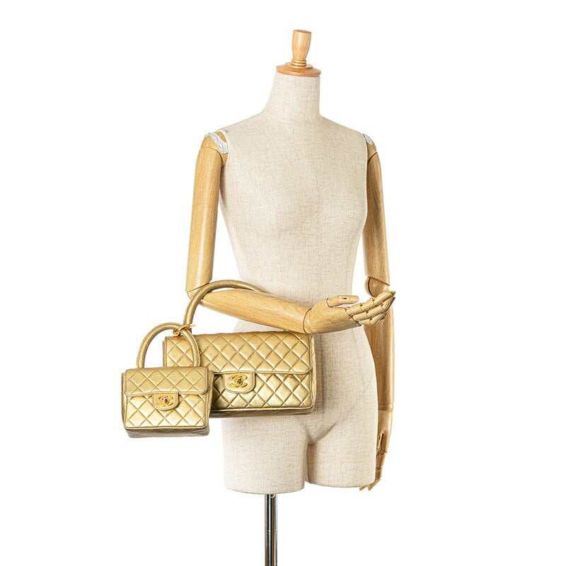 Chanel Matelasse Coco Mark Handbag Gold