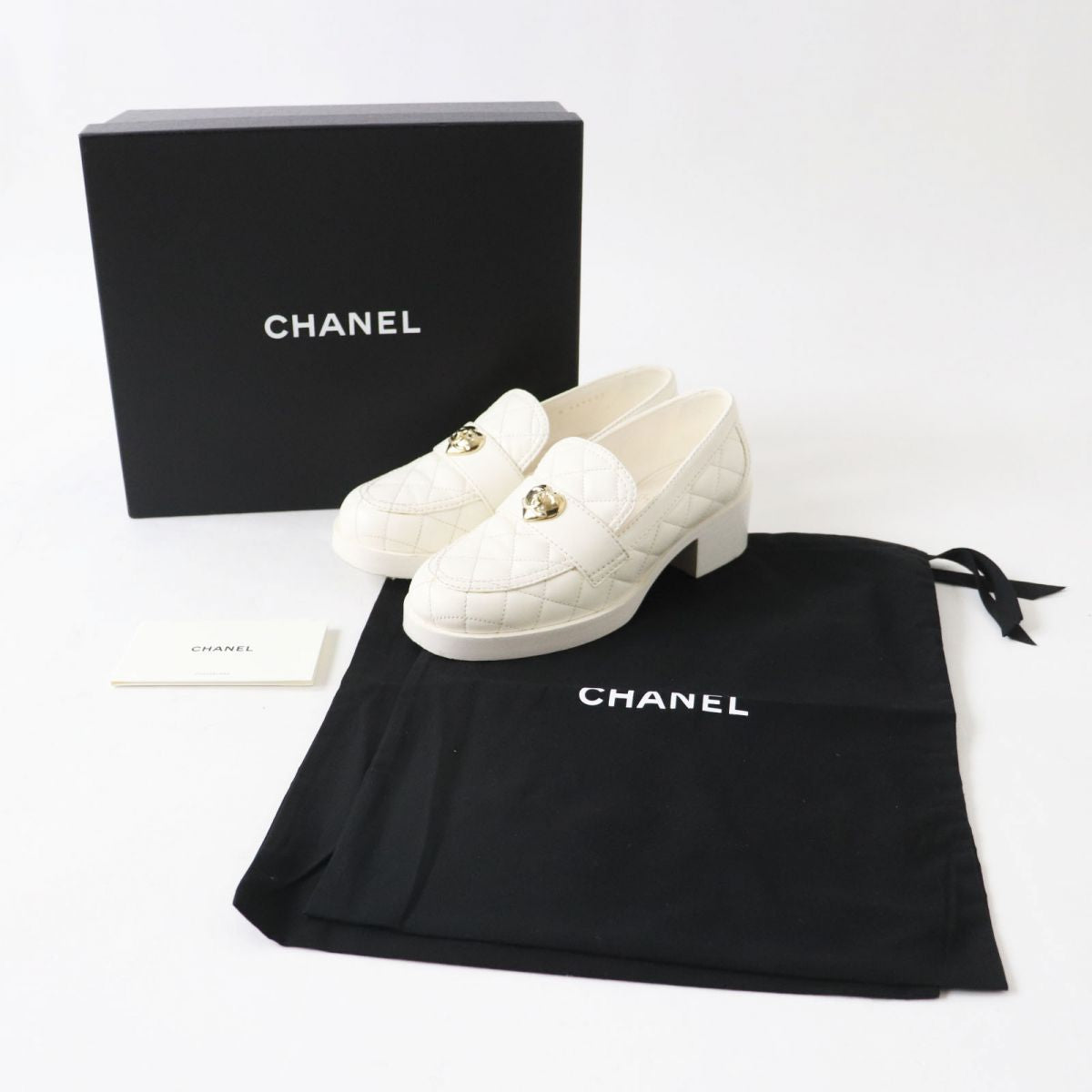 Chanel Lambskin Heart Turnlock Loafers White