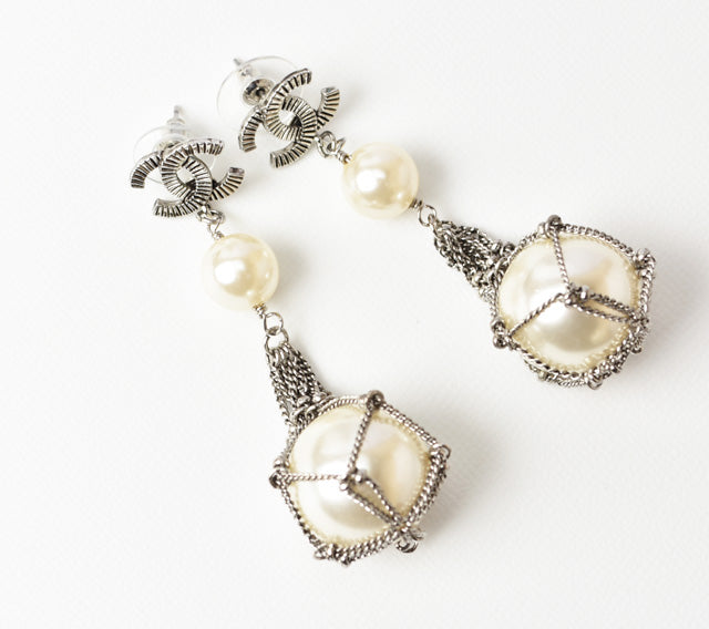 Chanel Silver Pearl Motif Earrings in Excellent Condition