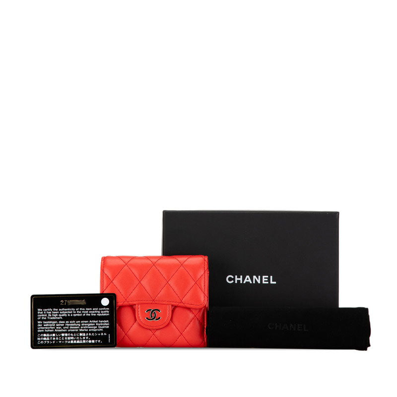 Chanel Matelasse Coco Mark Small Wallet Orange Lambskin in Very Good Condition