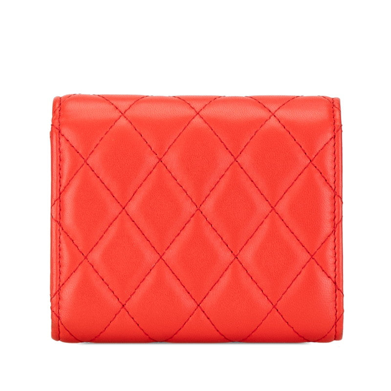 Chanel Matelasse Coco Mark Small Wallet Orange Lambskin in Very Good Condition