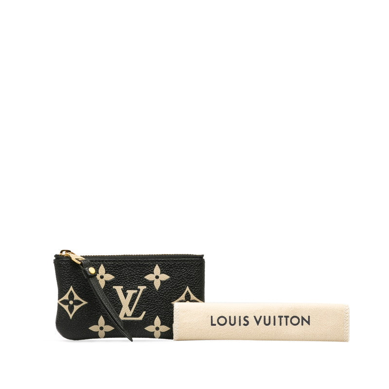 Louis Vuitton Monogram Empreinte Bicolor Leather Pochette M80885