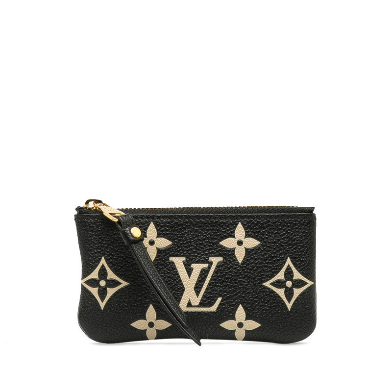 Louis Vuitton Monogram Empreinte Bicolor Leather Pochette M80885