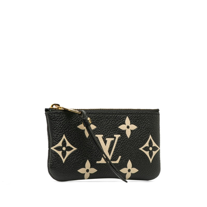 Louis Vuitton Monogram Empreinte Bicolor Leather Pochette M80885