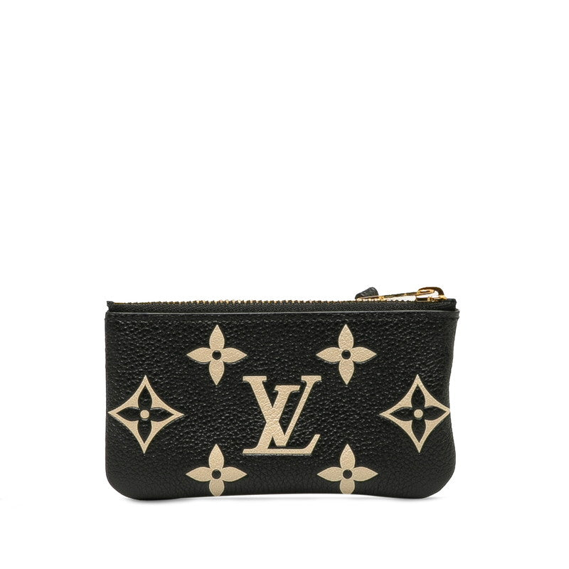 Louis Vuitton Monogram Empreinte Bicolor Leather Pochette M80885