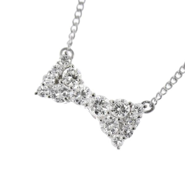 Platinum Diamond Bow Pendant Necklace in Excellent Condition