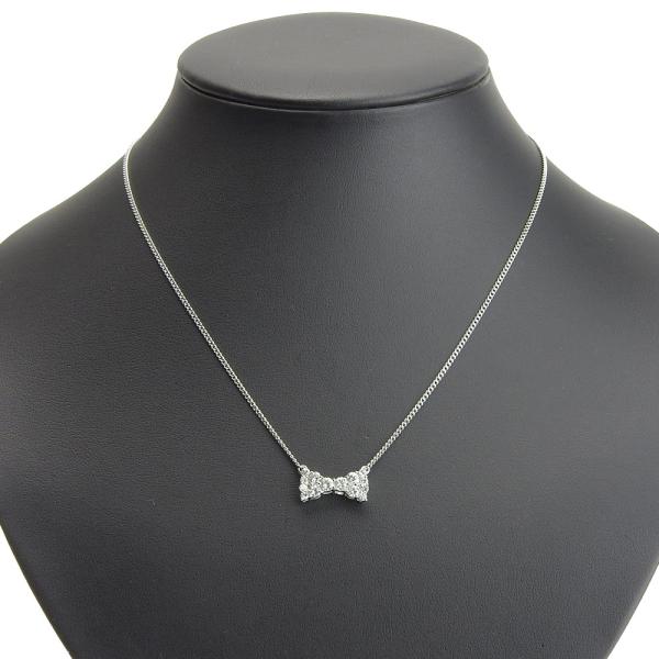 Platinum Diamond Bow Pendant Necklace in Excellent Condition