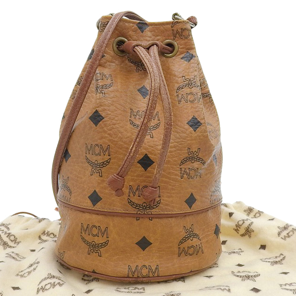 MCM Coated Canvas Drawstring Shoulder Bag Brown in Very Good Condition