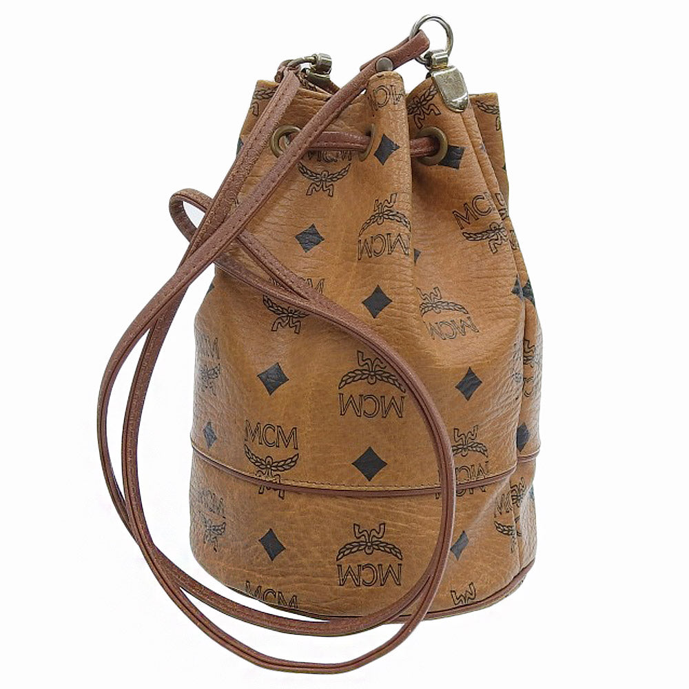 MCM Coated Canvas Drawstring Shoulder Bag Brown in Very Good Condition