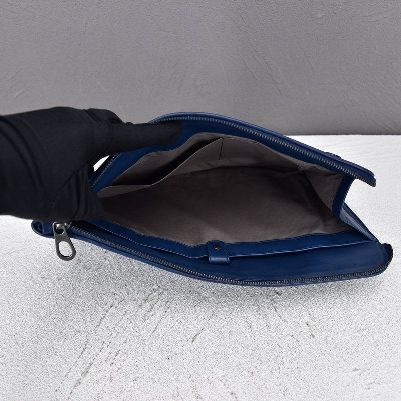 Intercciato Leather Clutch Bag