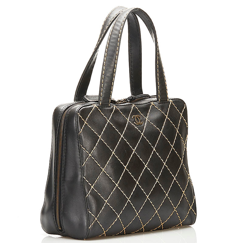 Surpique Leather Handbag