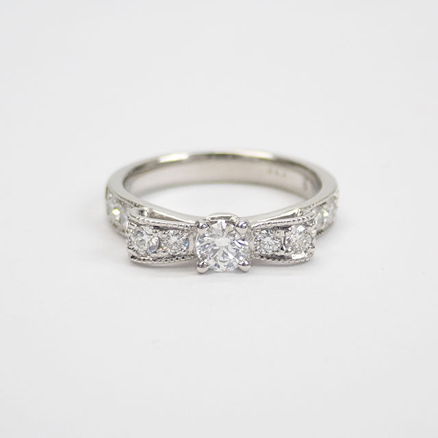 Women's Size 10 Platinum PT900 Diamond Ring with Ribbon Motif, Diamond 0.32ct