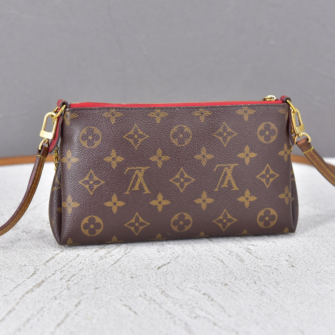 Monogram Pallas Clutch